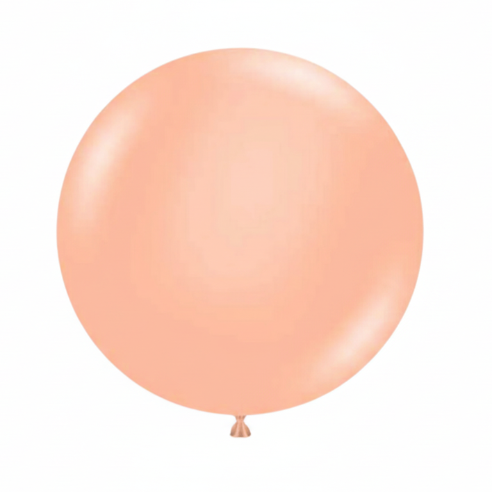 Large peach-colored balloon on a white background
