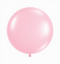Single pearl pink balloon on a white background